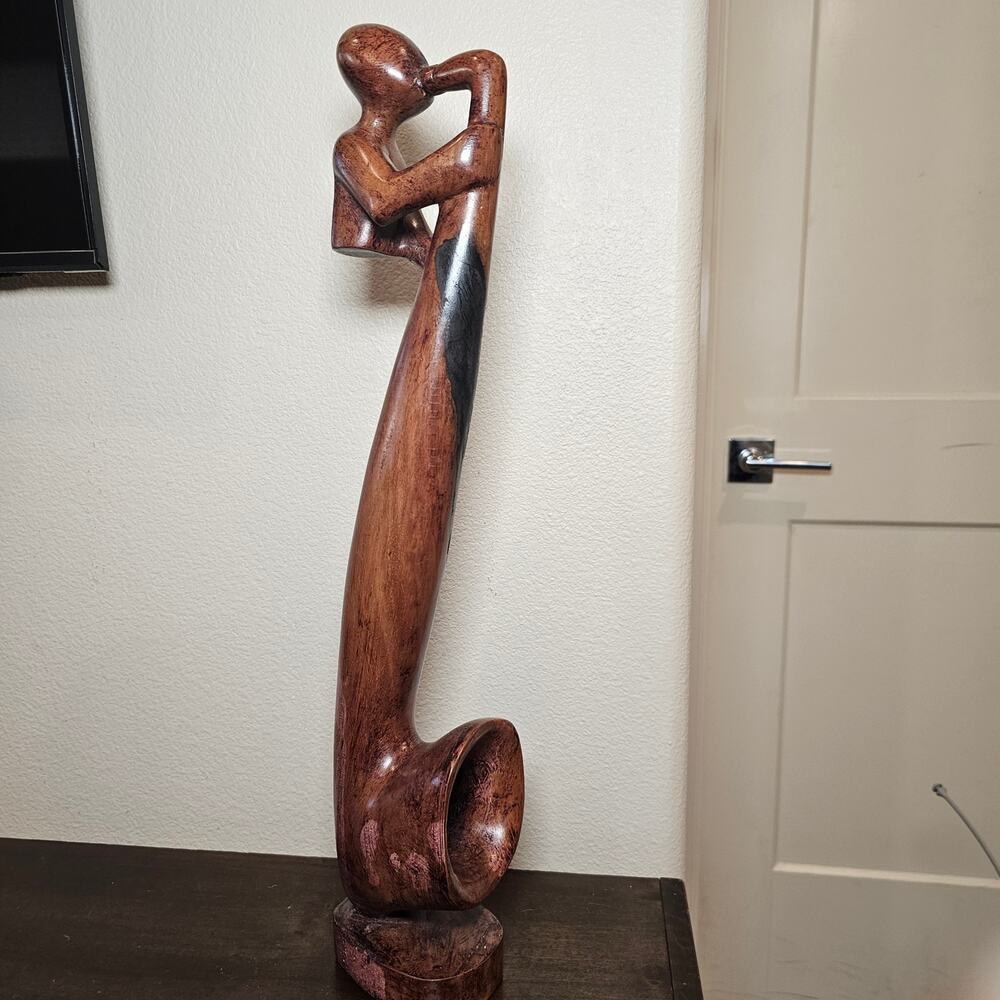 African Wooden Carving Man Playing the Saxophone